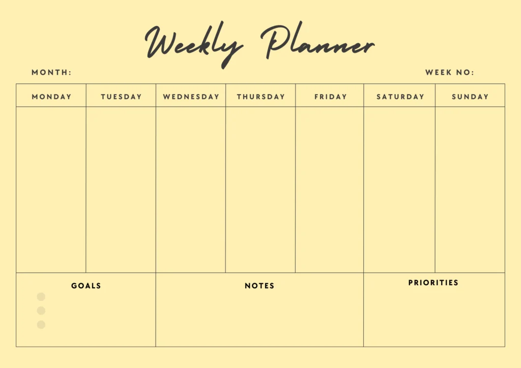 black boxed weekly planner on a yellow background